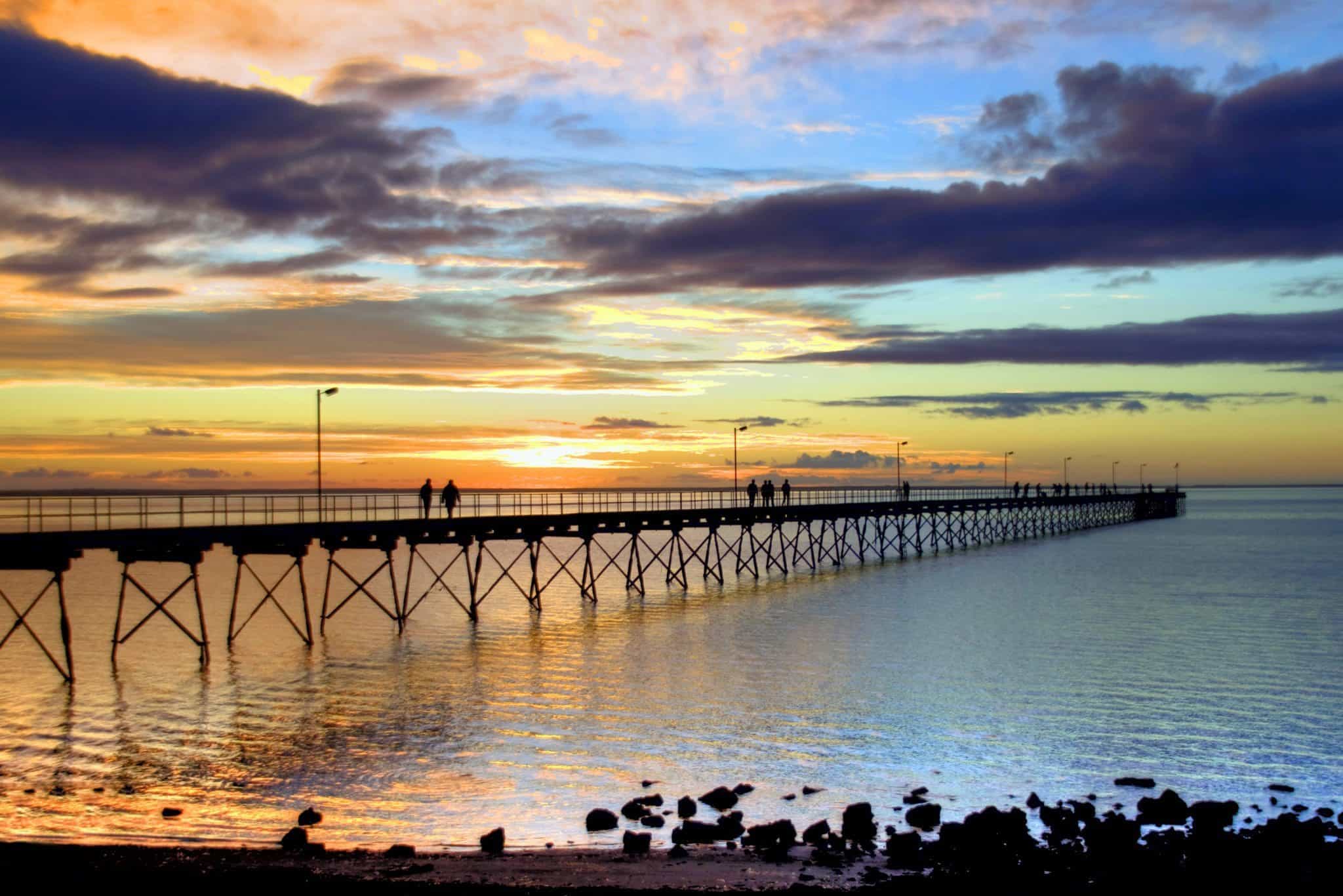 People walking down the Ceduna Jetty at Sunset