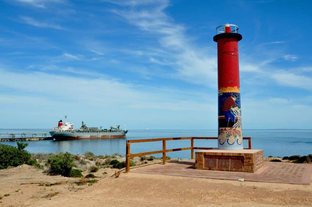 Thevenard Wharf & Lighthouse monument with ship in port