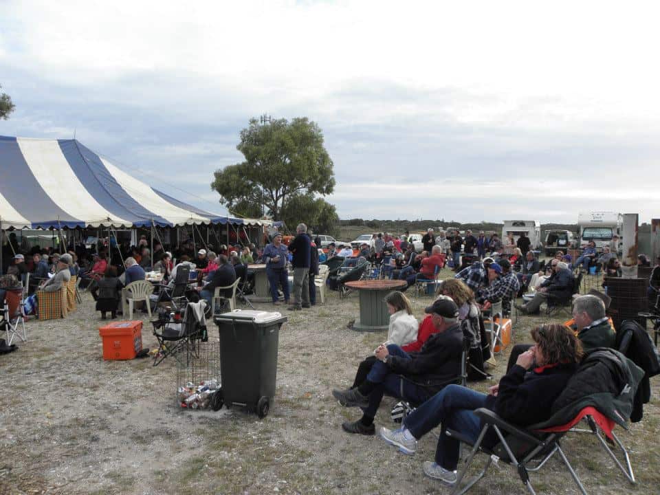 Visitors seated outside the marquee at Marilyns Music Muster